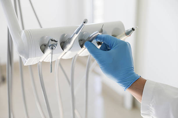 Professional Emergency Dentist technician working in Bloomfield, IN